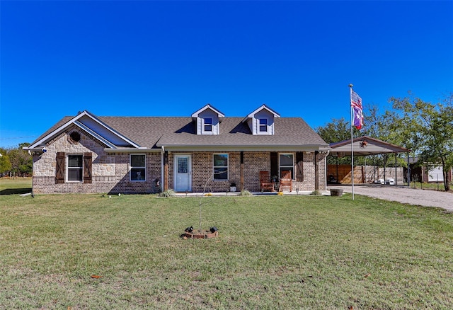 view of front facade featuring a front lawn and a carport