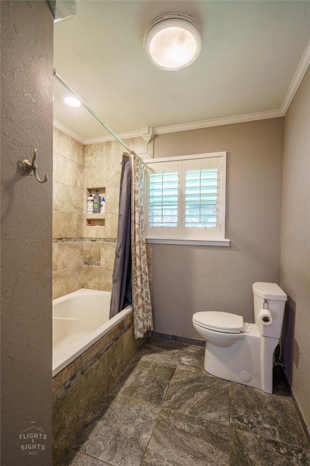 bathroom featuring toilet, crown molding, and shower / bathtub combination with curtain