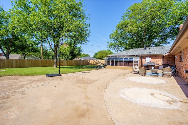 view of patio / terrace with area for grilling, an outdoor hangout area, and a sunroom