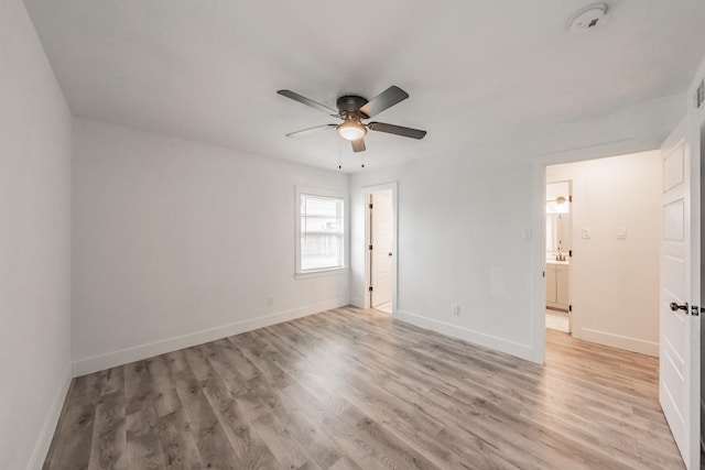 unfurnished bedroom featuring ceiling fan and light hardwood / wood-style flooring