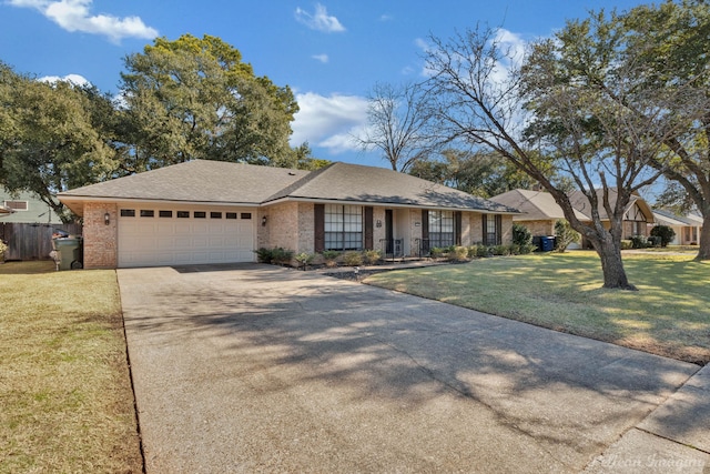 single story home featuring a garage and a front yard