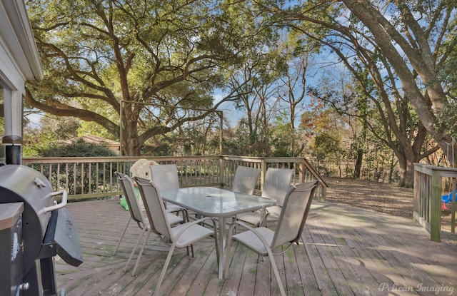 wooden deck with area for grilling