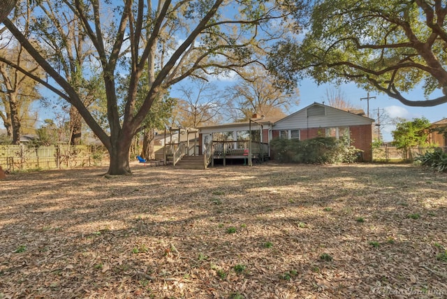 view of yard featuring a deck