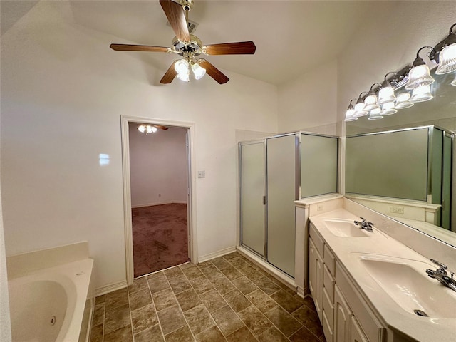 bathroom featuring ceiling fan, vanity, vaulted ceiling, and plus walk in shower