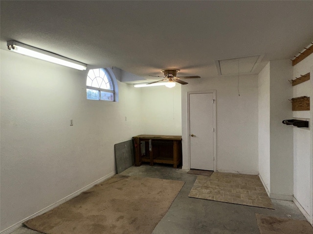 basement with ceiling fan