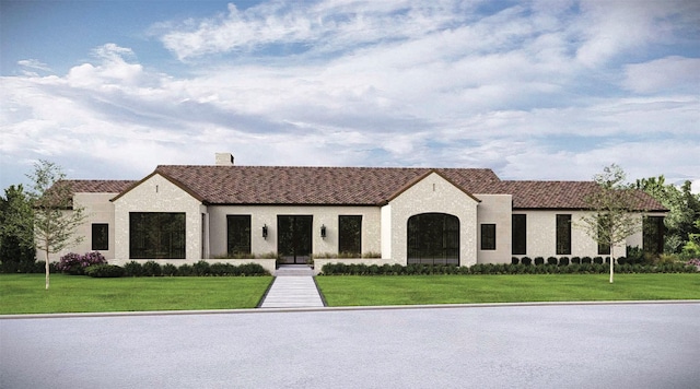 view of front of home featuring a front lawn