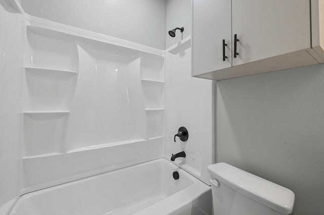 bathroom with toilet and tub / shower combination