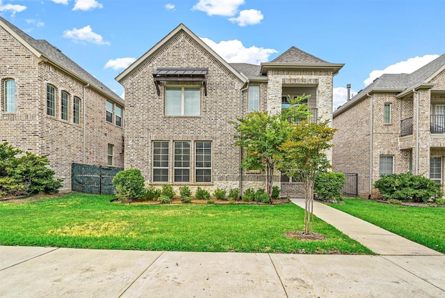 view of front of home with a front lawn