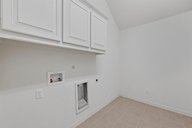 washroom featuring cabinets, hookup for a gas dryer, hookup for a washing machine, hookup for an electric dryer, and light tile patterned floors