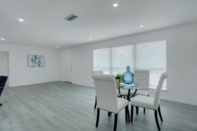 dining area with light wood-type flooring