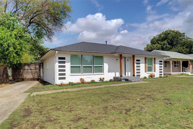 view of front of property with a front lawn