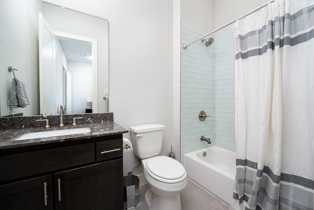 full bathroom featuring toilet, vanity, and shower / tub combo with curtain