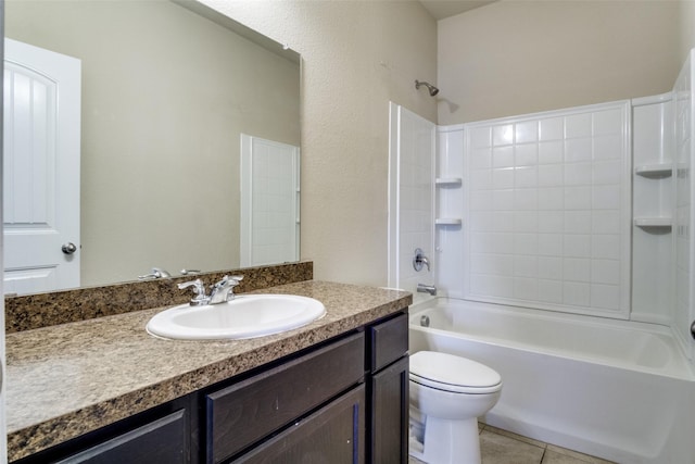 full bathroom with tile patterned floors, washtub / shower combination, vanity, and toilet