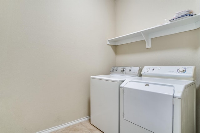 laundry room with separate washer and dryer