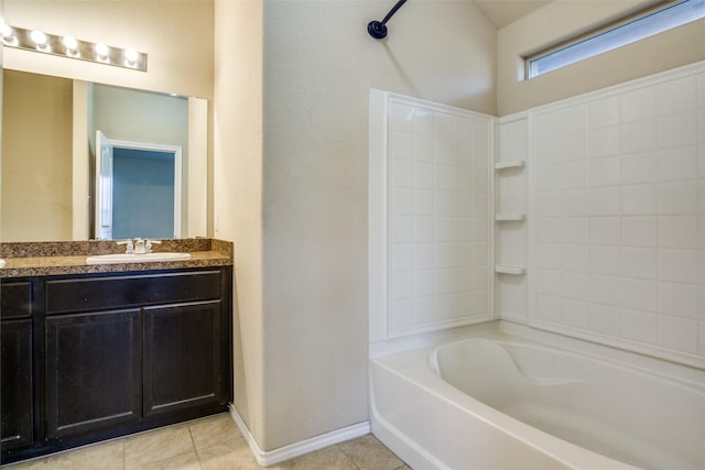 bathroom with shower / bath combination, tile patterned floors, and vanity