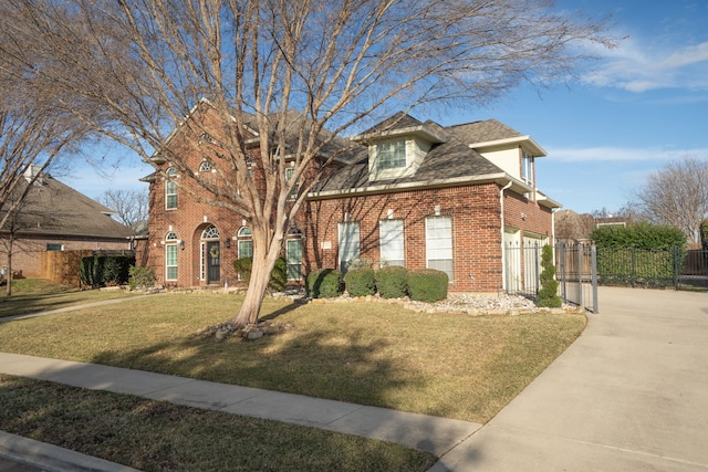 view of front of property with a front lawn