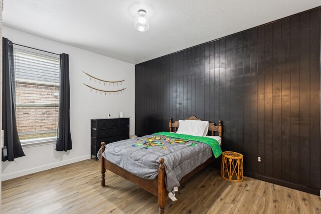 bedroom featuring hardwood / wood-style floors