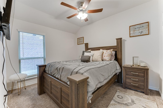 carpeted bedroom featuring ceiling fan and lofted ceiling