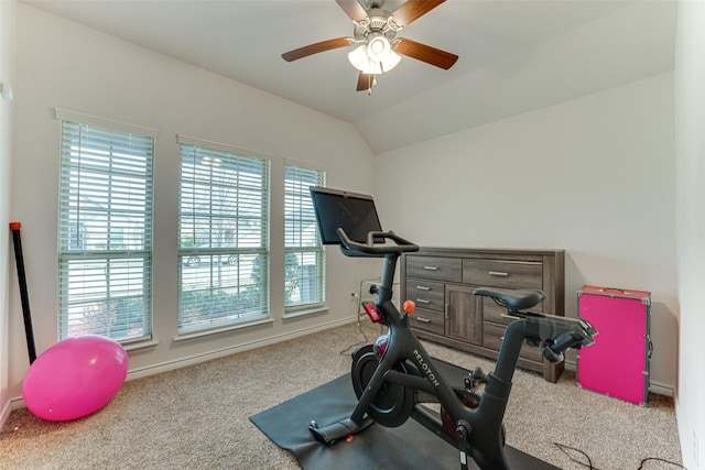 exercise area with carpet floors, ceiling fan, and vaulted ceiling