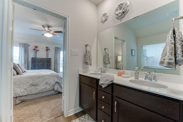 bathroom featuring ceiling fan and vanity