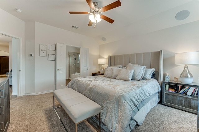 carpeted bedroom with ceiling fan and lofted ceiling