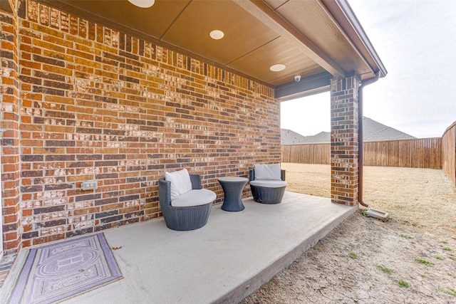 view of patio with ceiling fan