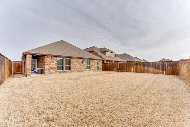 rear view of house featuring a patio