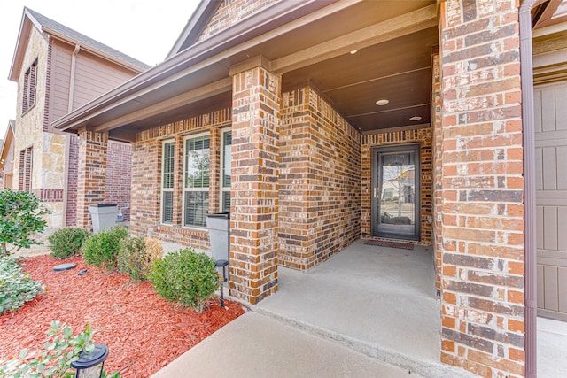 doorway to property with covered porch