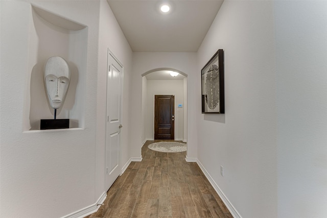 corridor featuring hardwood / wood-style flooring