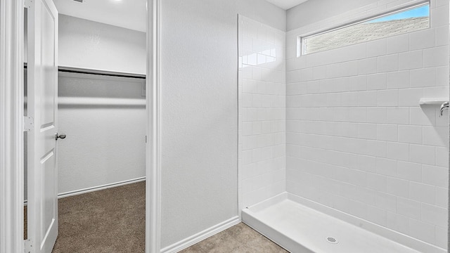 bathroom featuring walk in shower