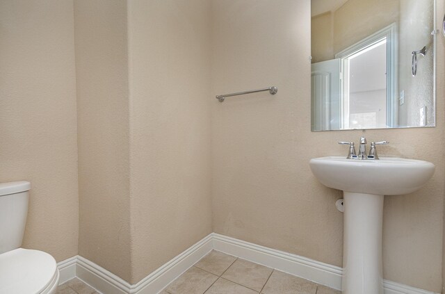 bathroom featuring ceiling fan, tile patterned floors, an enclosed shower, and vanity