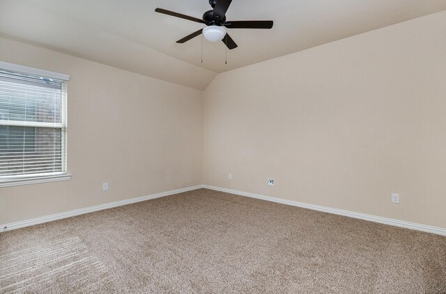 empty room featuring ceiling fan and carpet flooring