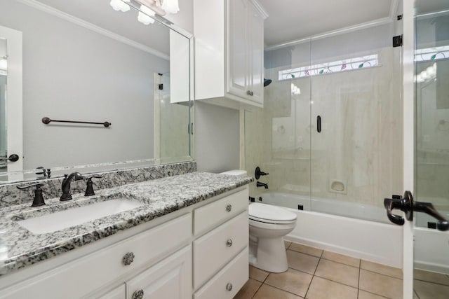 full bathroom with enclosed tub / shower combo, tile patterned floors, vanity, toilet, and crown molding