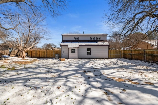 view of snow covered house