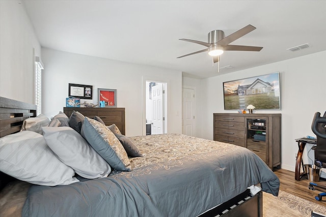 bedroom featuring ceiling fan and wood-type flooring