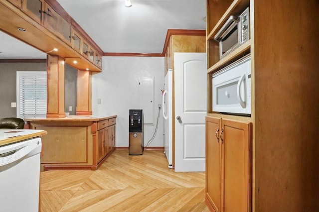 kitchen featuring white appliances, ornamental molding, and light parquet floors