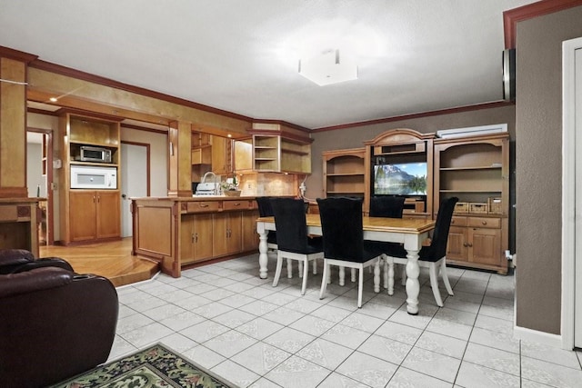 tiled dining area with ornamental molding