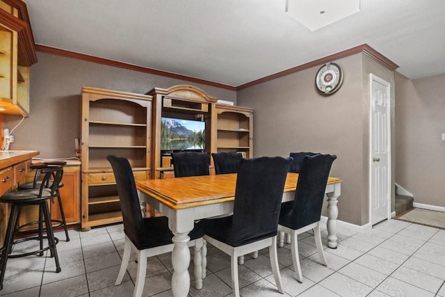 tiled dining area with ornamental molding