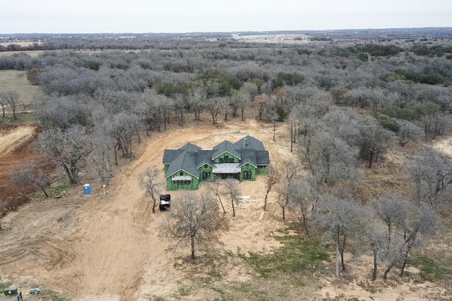 birds eye view of property with a rural view