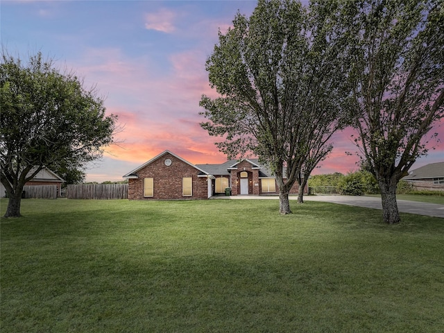 view of front of home featuring a yard