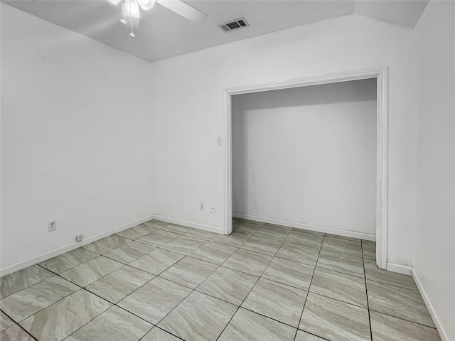 empty room featuring ceiling fan