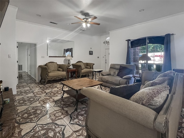 tiled living room featuring ceiling fan and ornamental molding