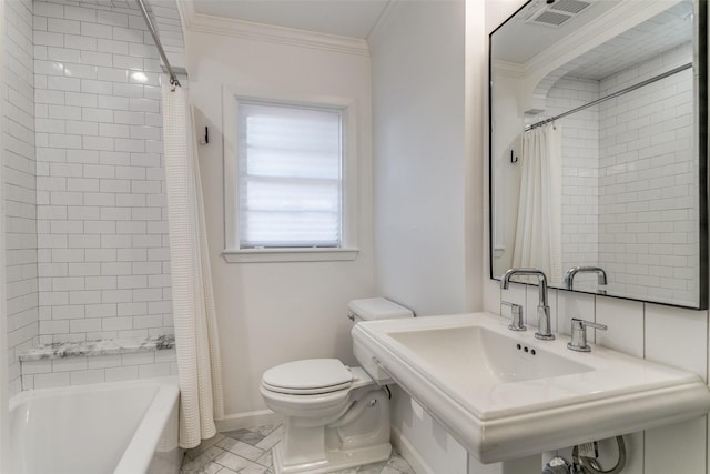 full bathroom with toilet, sink, crown molding, and shower / bath combo with shower curtain