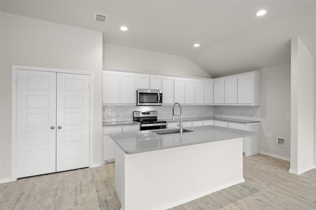 3656 N Crowley Cleburne Rd, Fort Worth, TX 76036 - kitchen with an island with sink, appliances with stainless steel finishes, sink, and white cabinets