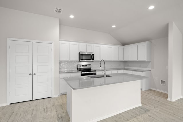 3656 N Crowley Cleburne Rd, Fort Worth, TX 76036 - kitchen featuring an island with sink, stainless steel appliances, sink, and white cabinets