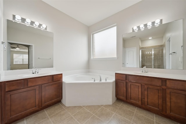 bathroom with ceiling fan, shower with separate bathtub, plenty of natural light, and vanity