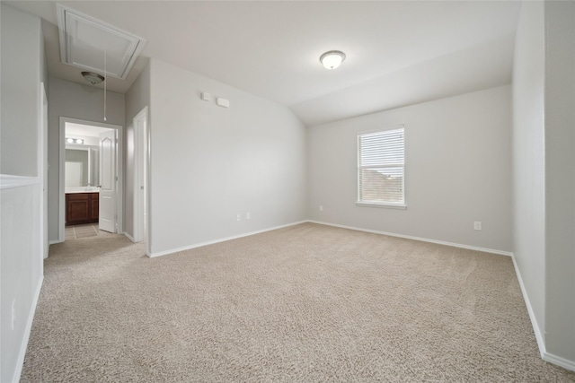 empty room featuring light carpet