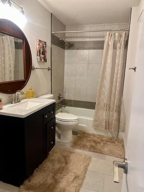 full bathroom with shower / bathtub combination with curtain, vanity, and toilet