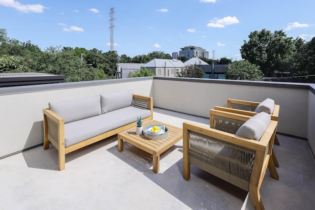 view of patio / terrace featuring an outdoor living space and a balcony