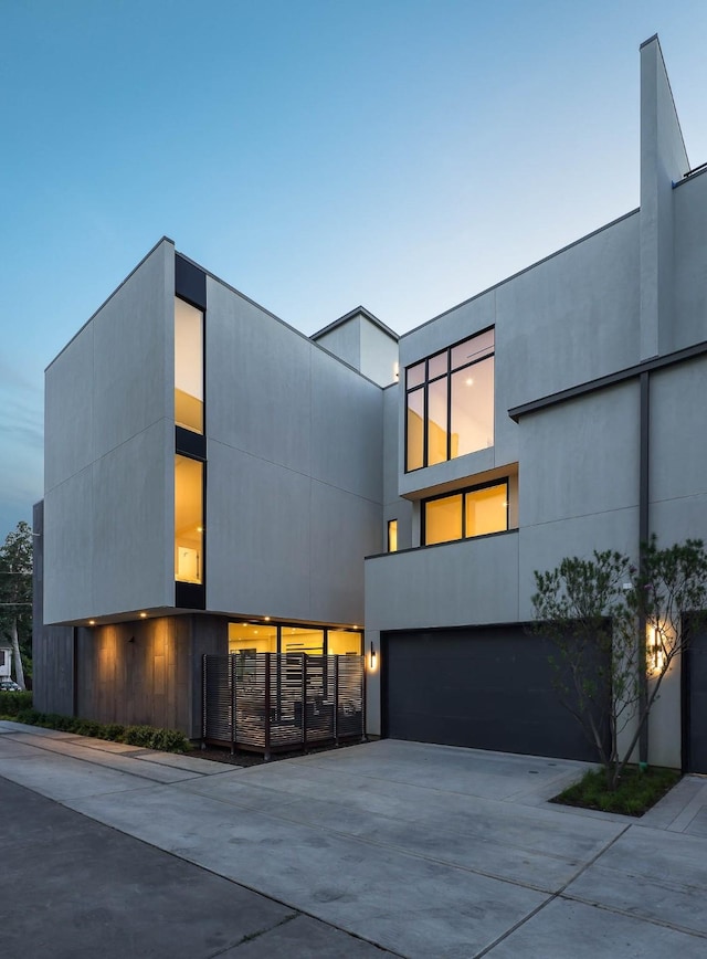 modern home featuring a garage